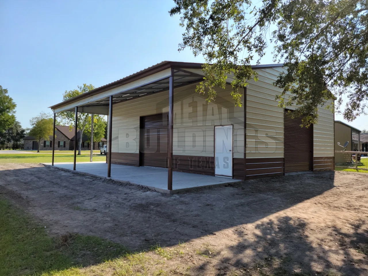 Metal shop with an overhead door and broad covered front area